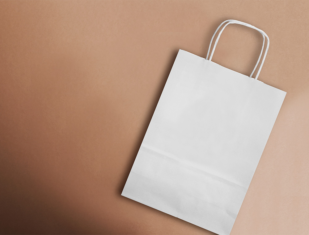 SACO DE PAPEL Q-CONNECT CELULOSE BRANCO XS COM ASA TORCIDA 180X240X80 MM